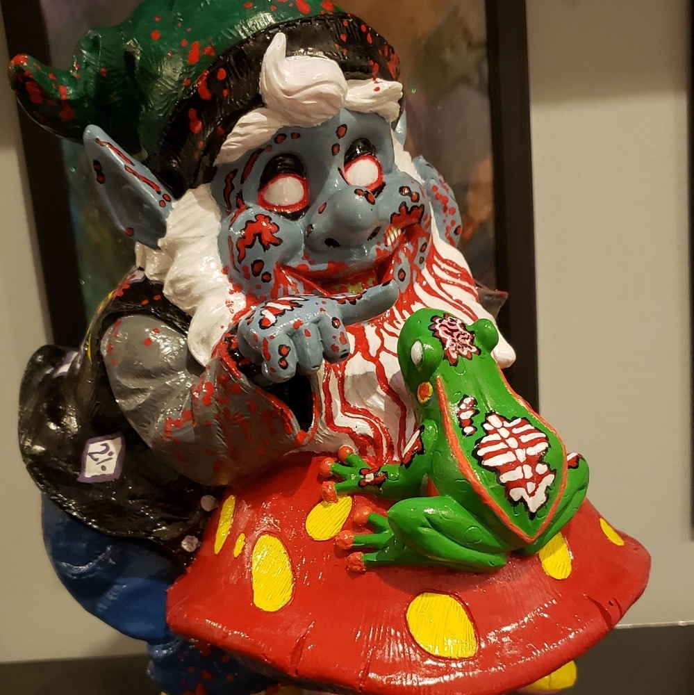Re-claimed Garden Gnome with new original artwork.